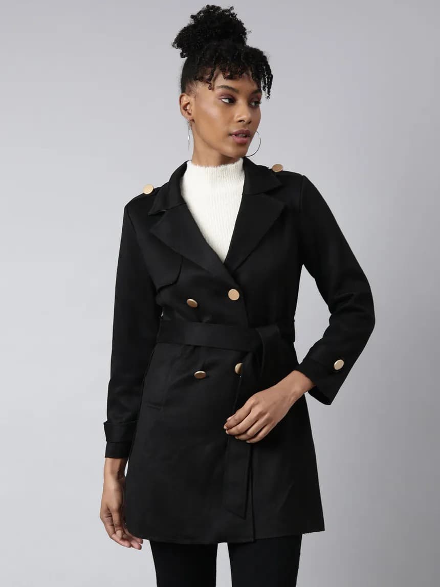 Black belted double-breasted coat with gold buttons on a model